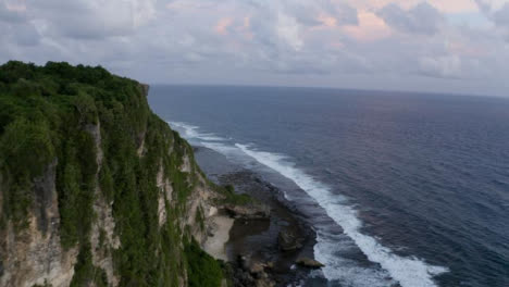 Drone-Shot-Flying-Over-Uluwatu-Coastal-Cliff-Edge-