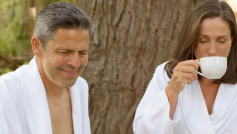 Close-Up-Shot-of-Middle-Aged-Couple-Drinking-Coffee-During-Outdoor-Breakfast