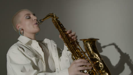 Close-Up-Shot-of-Saxophonist-Performing-