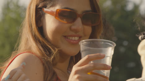 Close-Up-Shot-of-Young-Festival-Goer-Enjoying-Music-at-Stage-Barrier