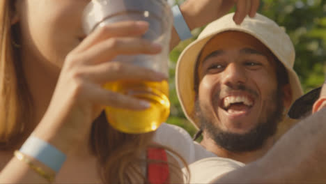 Close-Up-Shot-of-Young-Festival-Goers-Enjoying-Music-at-the-Stage-Barrier