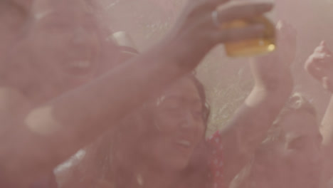 Close-Up-Shot-of-Young-Festival-Goers-at-Festival-Stage-Barrier-the-Enjoying-Music