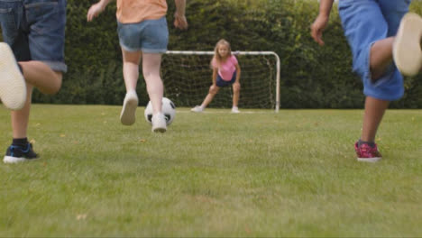 Tracking-Shot-of-Group-of-Children-Playing-Football-07