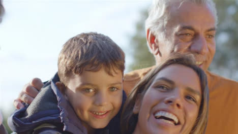 Close-Up-Shot-of-Family-Giving-Piggy-Backs-to-Their-Children-and-Laughing-03