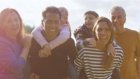 Low-Angle-Shot-of-Children-Piggy-Backing-On-Their-Parents-03