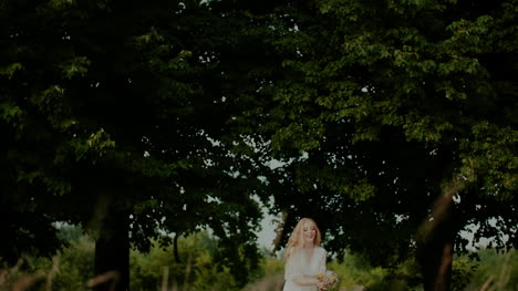 Young-Carefree-Woman-Tosses-Bouquet-Up-1