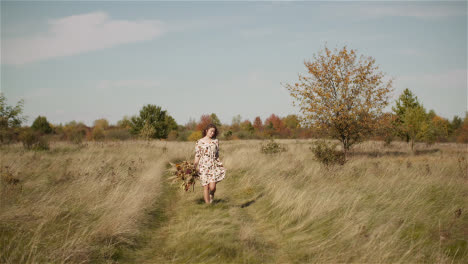 Woman-Walking-On-A-Meadow-In-Summer-Outdoors-1