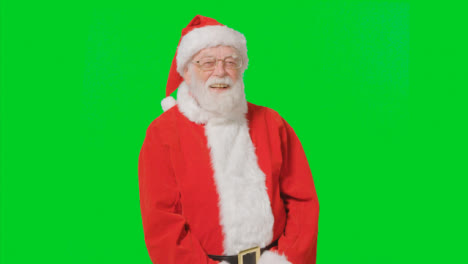 Portrait-Shot-of-Santa-Laughing-In-Front-of-Green-Screen