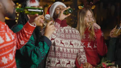 Tracking-Shot-Pulling-Away-from-a-Group-of-Friends-Celebrating-Christmas-at-Bar