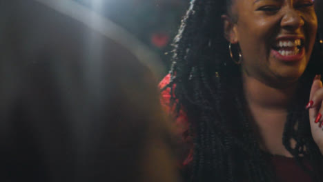 Close-Up-Shot-of-Woman-Dancing-In-Bar