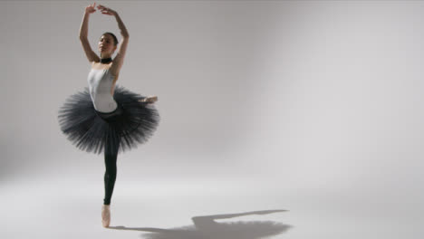 Wide-Shot-of-a-Ballerina-Spinning-and-Dancing-with-Copy-space