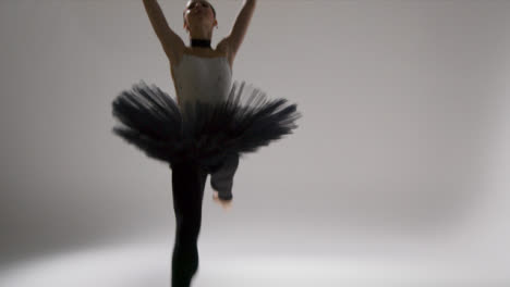 Wide-Shot-of-Ballet-Dancer-Jumping-Towards-Camera