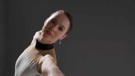 Close-Up-Shot-of-a-Ballet-Dancer-Dancing-and-Smiling-to-Camera