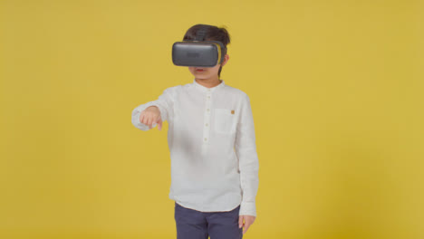 Mid-Shot-of-Little-Boy-Wearing-Virtual-Reality-Headset