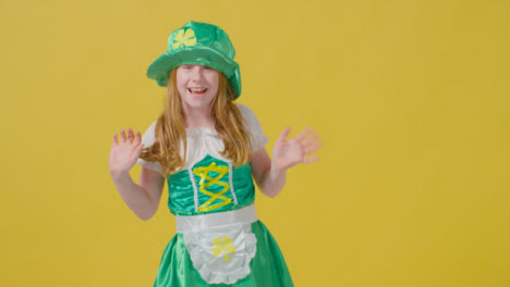 Mid-Shot-of-Little-Girl-Saying-Happy-St-Patrick's-Day