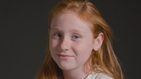 Close-Up-Shot-of-a-Little-Girl-Smiling-