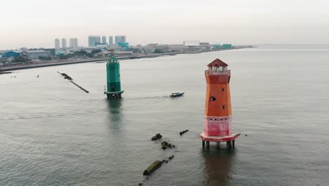 Drone-Shot-of-Lighthouses-in-the-Sea-in-Jakarta