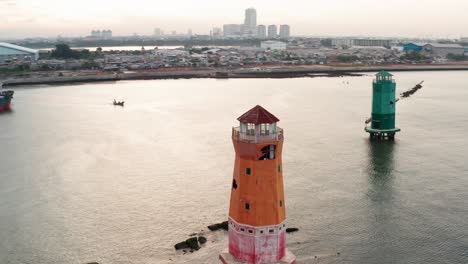 Drone-Shot-of-Lighthouses-in-Sea-in-Jakarta