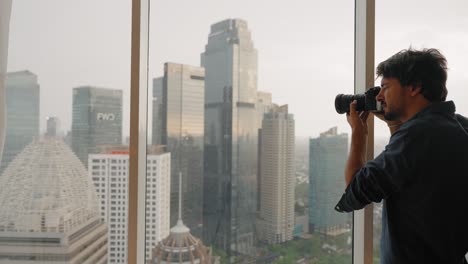 Long-Shot-of-a-Man-Taking-Photos-of-Jakarta