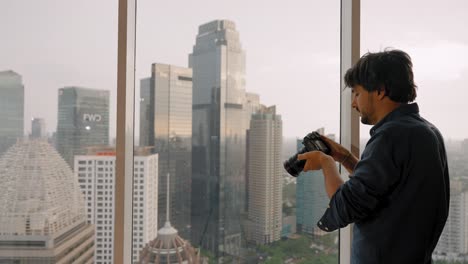 Long-Shot-of-Man-a-Taking-Photos-in-Jakarta
