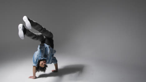 Long-Shot-of-a-Man-Breakdancing-with-Copy-Space