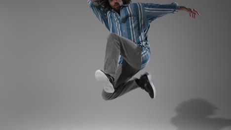 Tracking-Shot-of-a-Breakdancer-Jumping