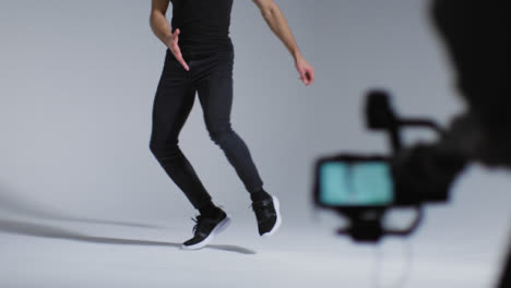 Long-Shot-of-Man-Breakdancing-Infront-of-Camera