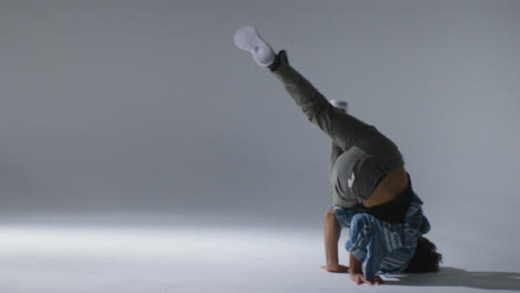 Mid-Shot-of-a-Boy-Dancer-Breakdancing