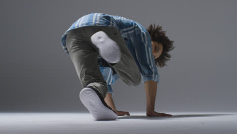 Long-Shot-of-Boy's-Legs-Breakdancing