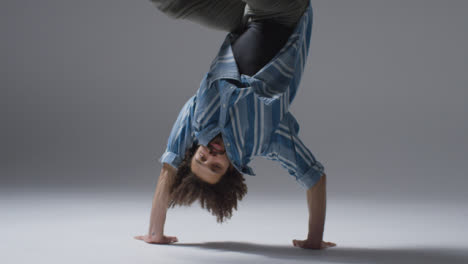 Mid-Shot-of-Breakdancer-Doing-Hand-Stands