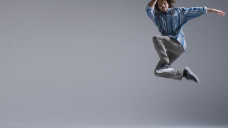 Long-Shot-of-a-Breakdancer-Jumping-with-Copy-Space