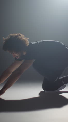 Vertical-Shot-of-Breakdancer-Balancing