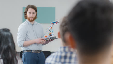 Over-the-Shoulder-Shot-of-Engineering-Teacher-Talking-to-His-Class-03