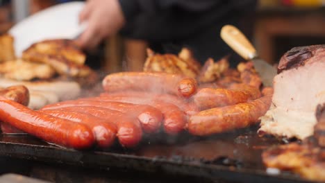 Close-Up-Sausages-Smoking-on-BBQ