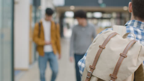 Tracking-Shot-of-Student-Walking-with-Rucksack