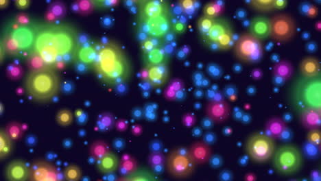 Fly-small-colorful-glitters-and-round-bokeh-on-dark-space