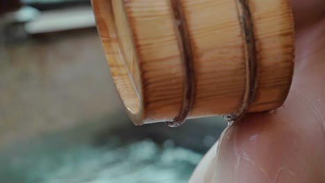 young-girl-holding-wood-barrel-scoop