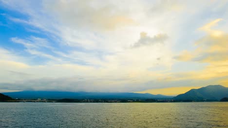 Sky-clouds-sunset-over-Kawaguchiko-Lake,-Japan.-4K-Timelapse