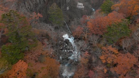 Aerial-view-of-Kegon-waterfall-and-autumn-foliage,-Nikko,-Tochigi,-Japan