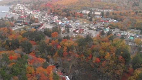 Aerial-view-of-Kegon-waterfall-and-autumn-foliage,-Nikko,-Tochigi,-Japan