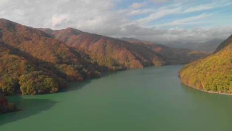 Aerial-view-of-lake-Kawamata-and-autumn-foliage,-Nikko,-Tochigi,-Japan