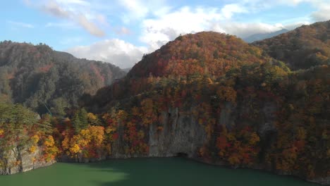 Aerial-view-of-lake-Kawamata-and-autumn-foliage,-Nikko,-Tochigi,-Japan