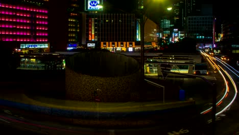 Night-lapse-4K-at-shinjuku-bus-rotary-slow-shutter-wide-shot-zoom-out