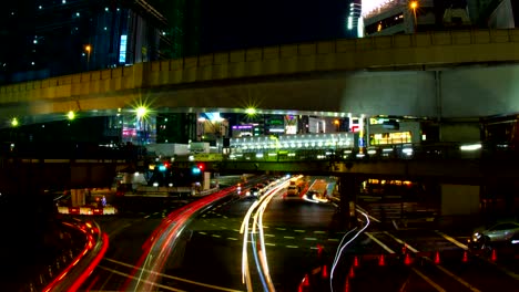 Intersection-near-shibuya-station-night-lapse-4K-slow-shutter-zoom-out