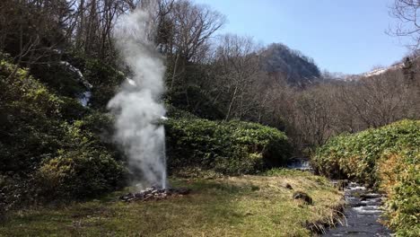 Shiretoko-National-Park-and--A-geyser-A-geyser-with-active-volcanoes