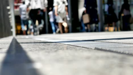 Anonymous-crowd-of-people-walking-on-walk-way-in-rush-hour-on-Osaka-station,Japan