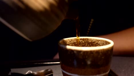 focus-on-pouring-sake-in-the-cup.-Japanese-tradition