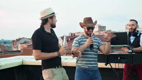 Team-of-young-people-dancing-and-having-fun-celebrate-with-toast-and-clinking-raising-glasses