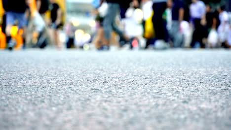 Legs-of-people-walking-on-the-crosswalk-in-Shibuya,-Tokyo-in-Japan.-4K