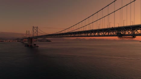 Aerial---Full-view-of-the-Minami-Bisan-seto-&-Kita-Bisan-seto-bridges-Go-up-evening-dusk